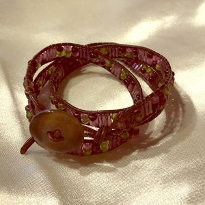 Leather wrap bracelet with purple beads